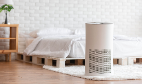 running air purifier with windows open